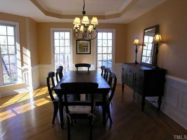 Sun-filled Dining Room Offers Serene Wooded Views of the Backyard. Wonderfully Sized with Bay Window, Trey Ceiling & Great Detailed Moldings Other