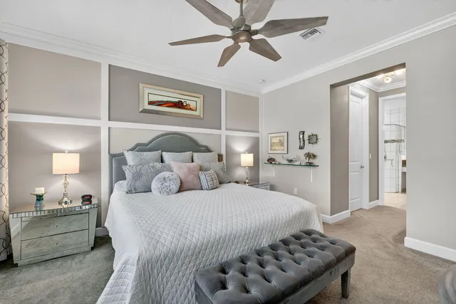 a living room with fireplace furniture and a chandelier