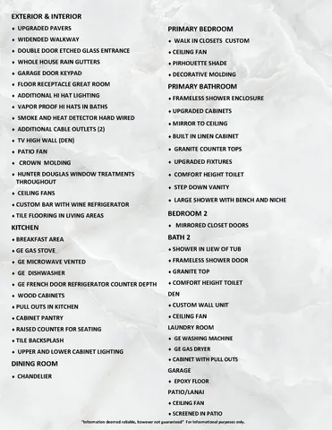 a living room with stainless steel appliances granite countertop furniture a fireplace a flat screen tv and a window