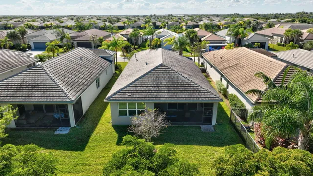 a view of a swimming pool with a table and chairs