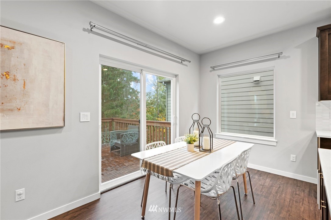 22708 41st Drive Southeast Bothell, WA 98021 - Photo 11 of 37 a view of a dining room with furniture window and outside view