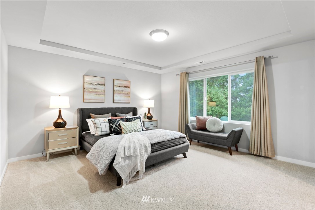 22708 41st Drive Southeast Bothell, WA 98021 - Photo 15 of 37 a bedroom with a bed and a couch