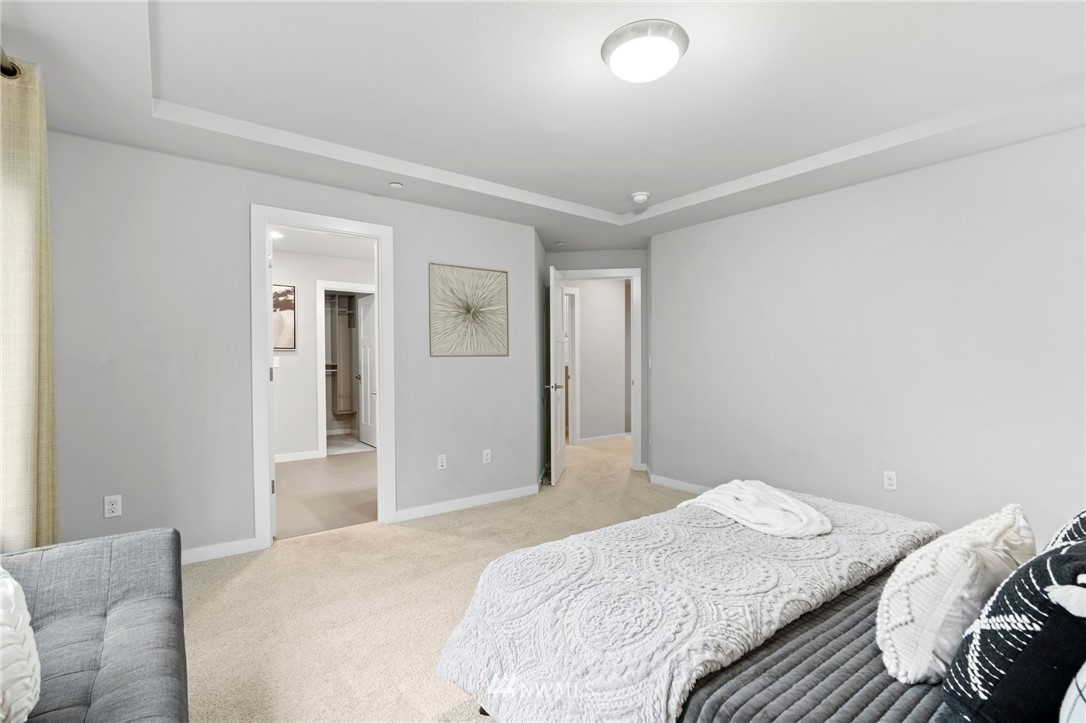 22708 41st Drive Southeast Bothell, WA 98021 - Photo 16 of 37 a bedroom with a bed and closet