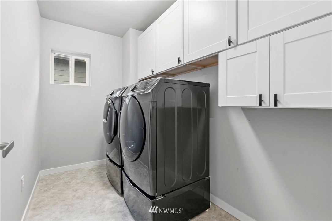 22708 41st Drive Southeast Bothell, WA 98021 - Photo 20 of 37 a utility room with dryer and washer