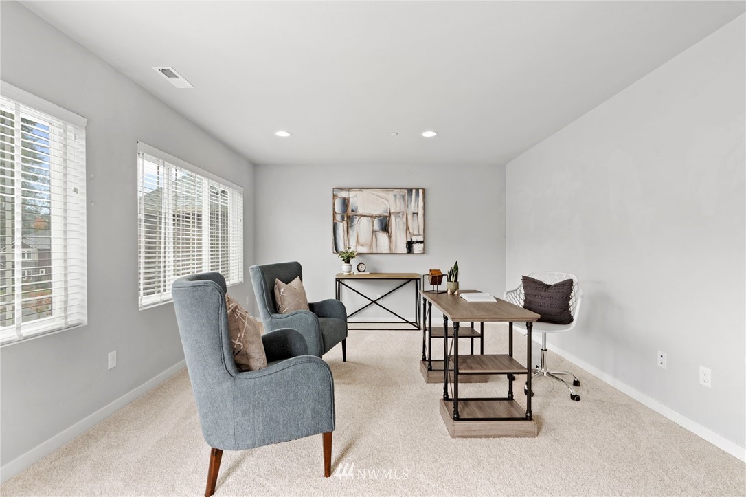 22708 41st Drive Southeast Bothell, WA 98021 - Photo 23 of 37 a view of a livingroom with furniture and a window
