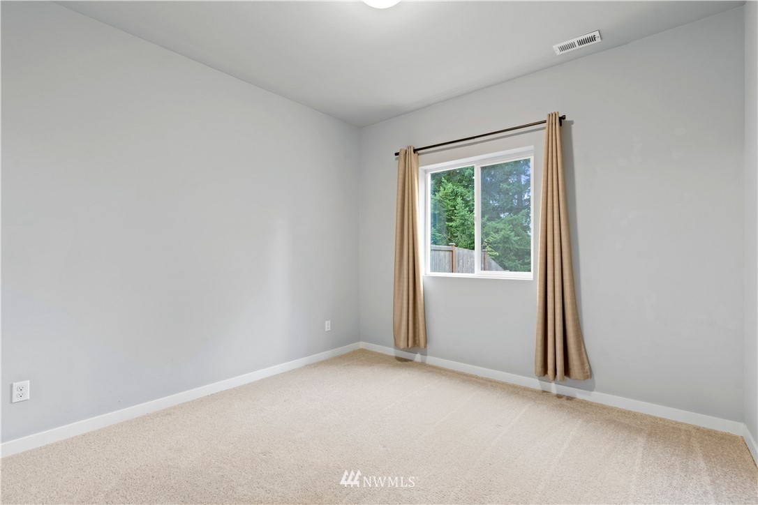 22708 41st Drive Southeast Bothell, WA 98021 - Photo 29 of 37 an empty room with a window