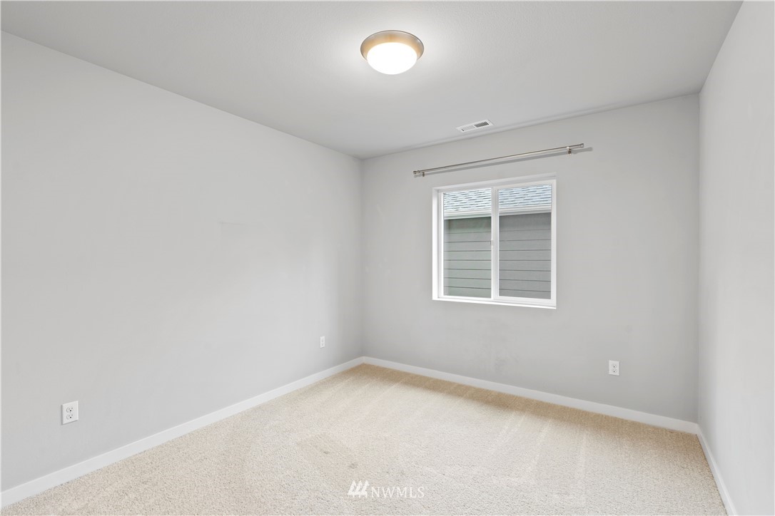 22708 41st Drive Southeast Bothell, WA 98021 - Photo 30 of 37 an empty room with a window