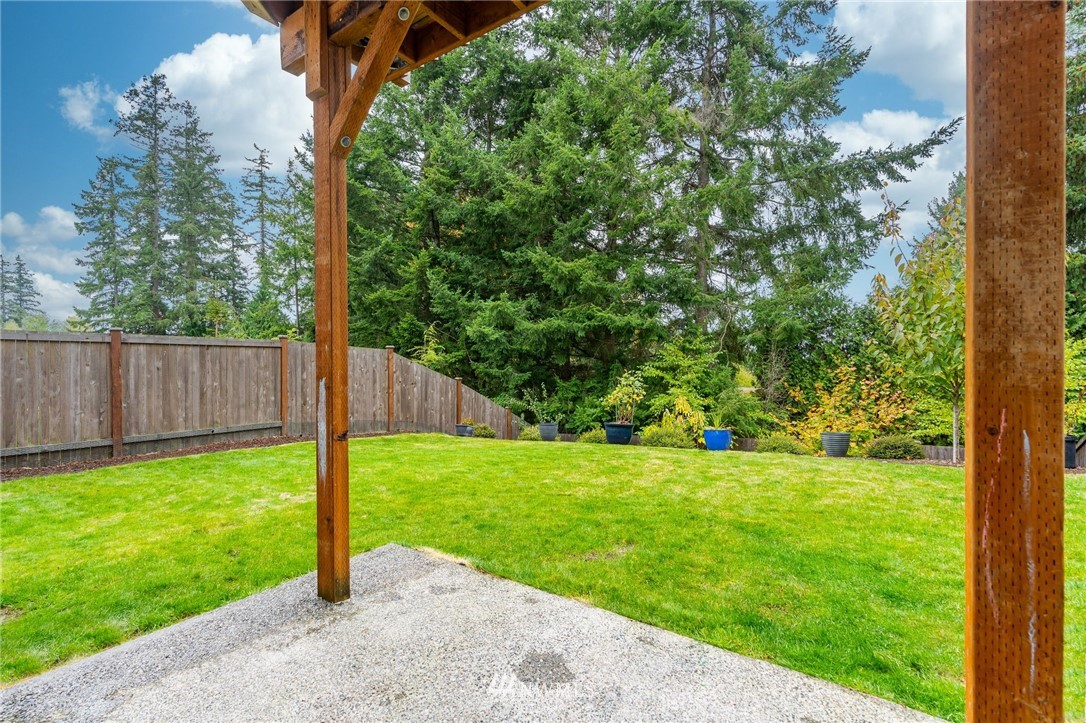 22708 41st Drive Southeast Bothell, WA 98021 - Photo 35 of 37 a view of a yard with a tree