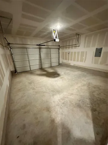 a bathroom with a double vanity sink and mirror