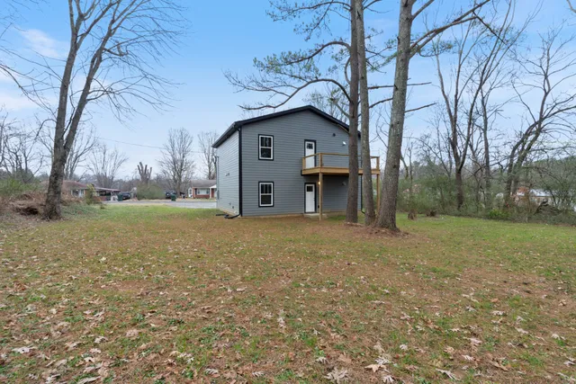 a house view with a backyard space