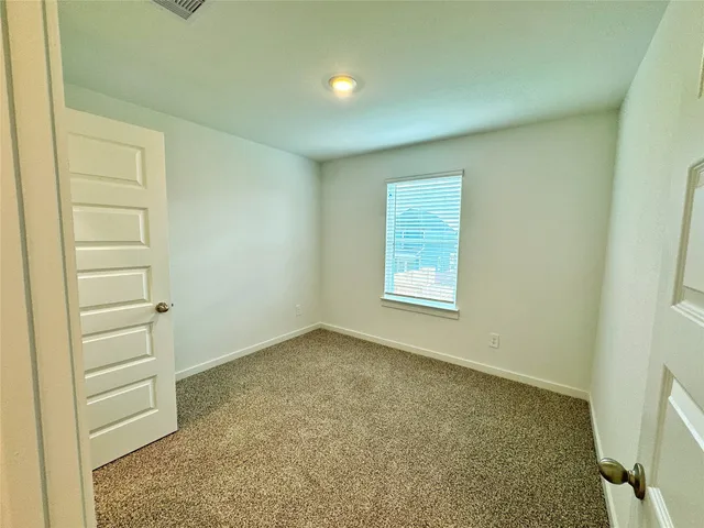 a bathroom with a sink toilet tub and shower