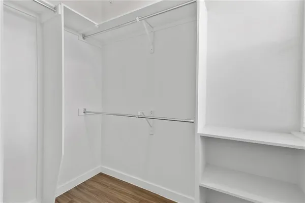 a view of an empty walk in closet