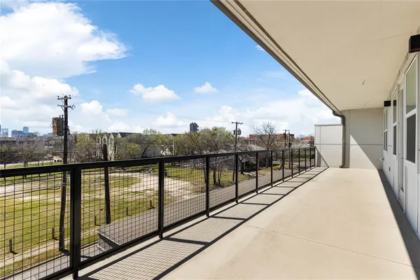 a view of city from a balcony