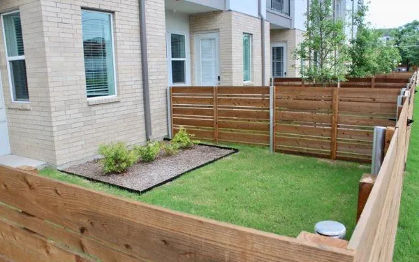 a view of a back yard of the house
