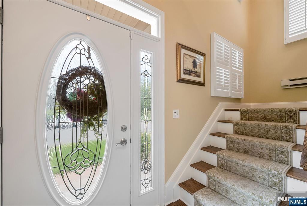 1508 Whitney Lane, Unit 1508 Allendale, NJ 07401 - Photo 2 of 24 a view of entryway with wooden floor