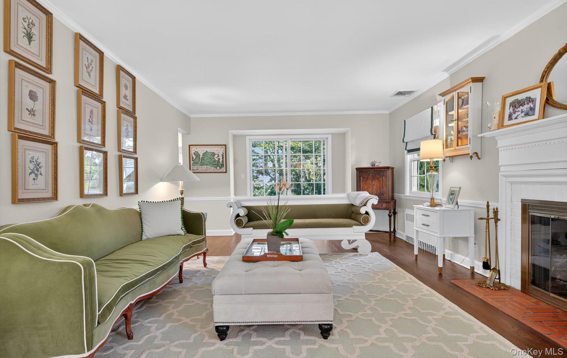 53 Eakins Road Manhasset, NY 11030 - Photo 16 of 34 a living room with furniture large window and flat screen tv