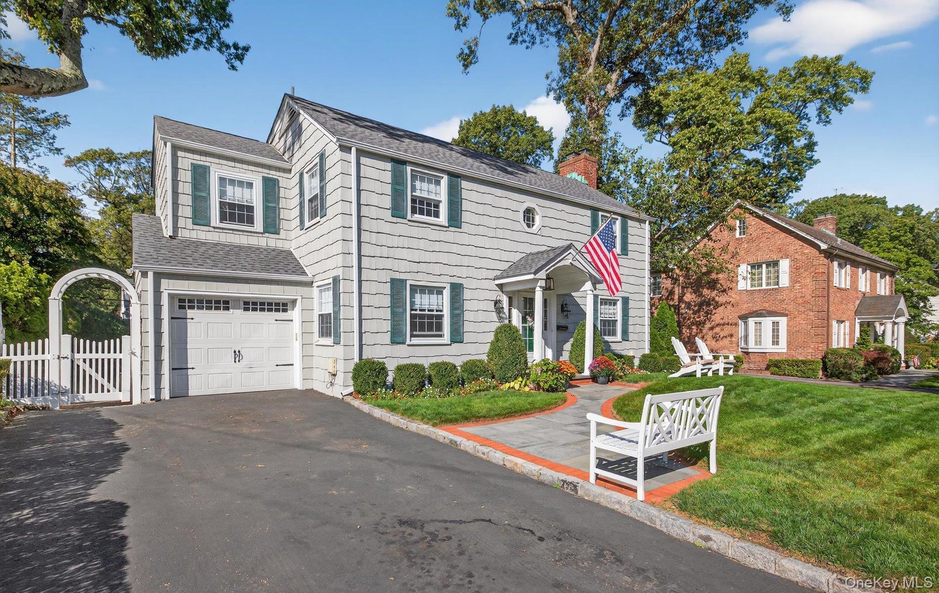 53 Eakins Road Manhasset, NY 11030 - Photo 2 of 34 a view of a house with a yard
