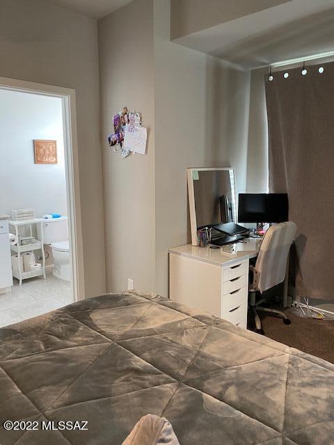 866 East Millenium Court Tucson, AZ 85719 - Photo 11 of 15 a room with a couch and a workspace