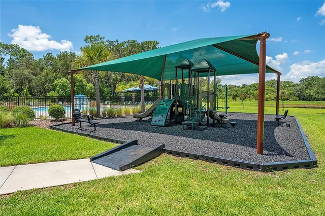 a view of a park with slide