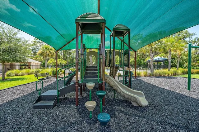 a view of a park with slide