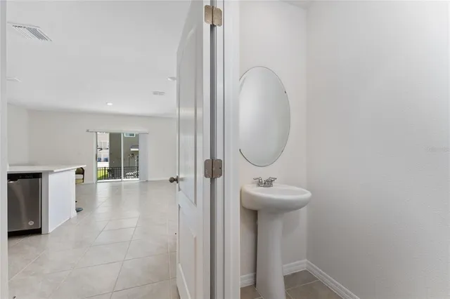 a view of a hallway with washer and dryer