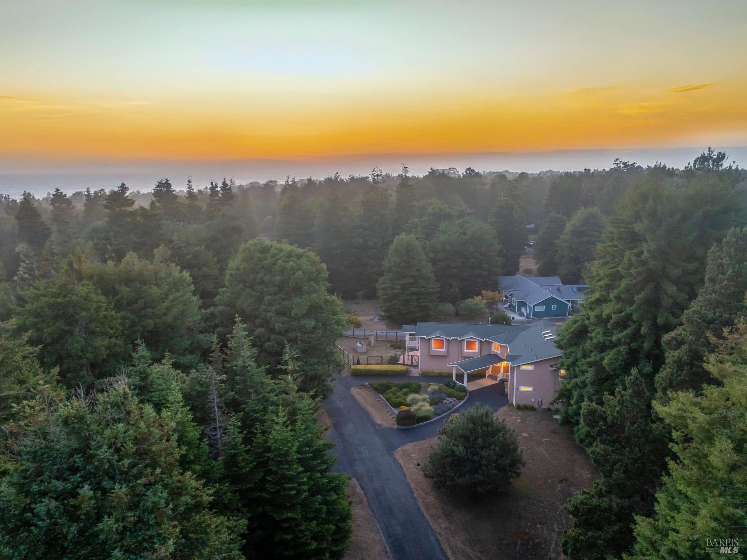 16611 Pearl Ranch Road Fort Bragg, CA 95437 - Photo 59 of 71 an aerial view of residential houses with outdoor space and trees