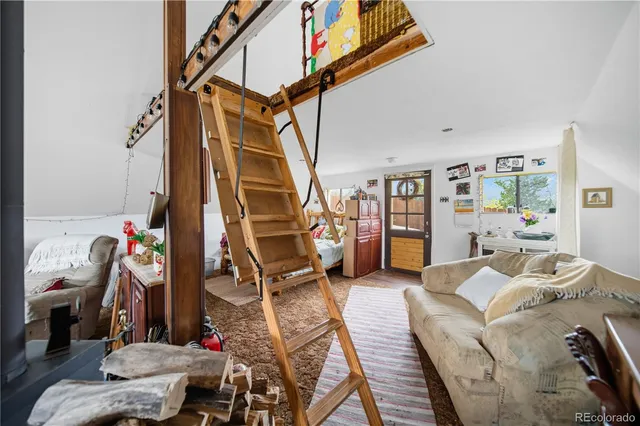 a view of a street with large trees