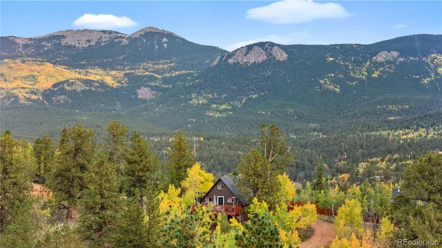 a view of mountain view with mountains in the background