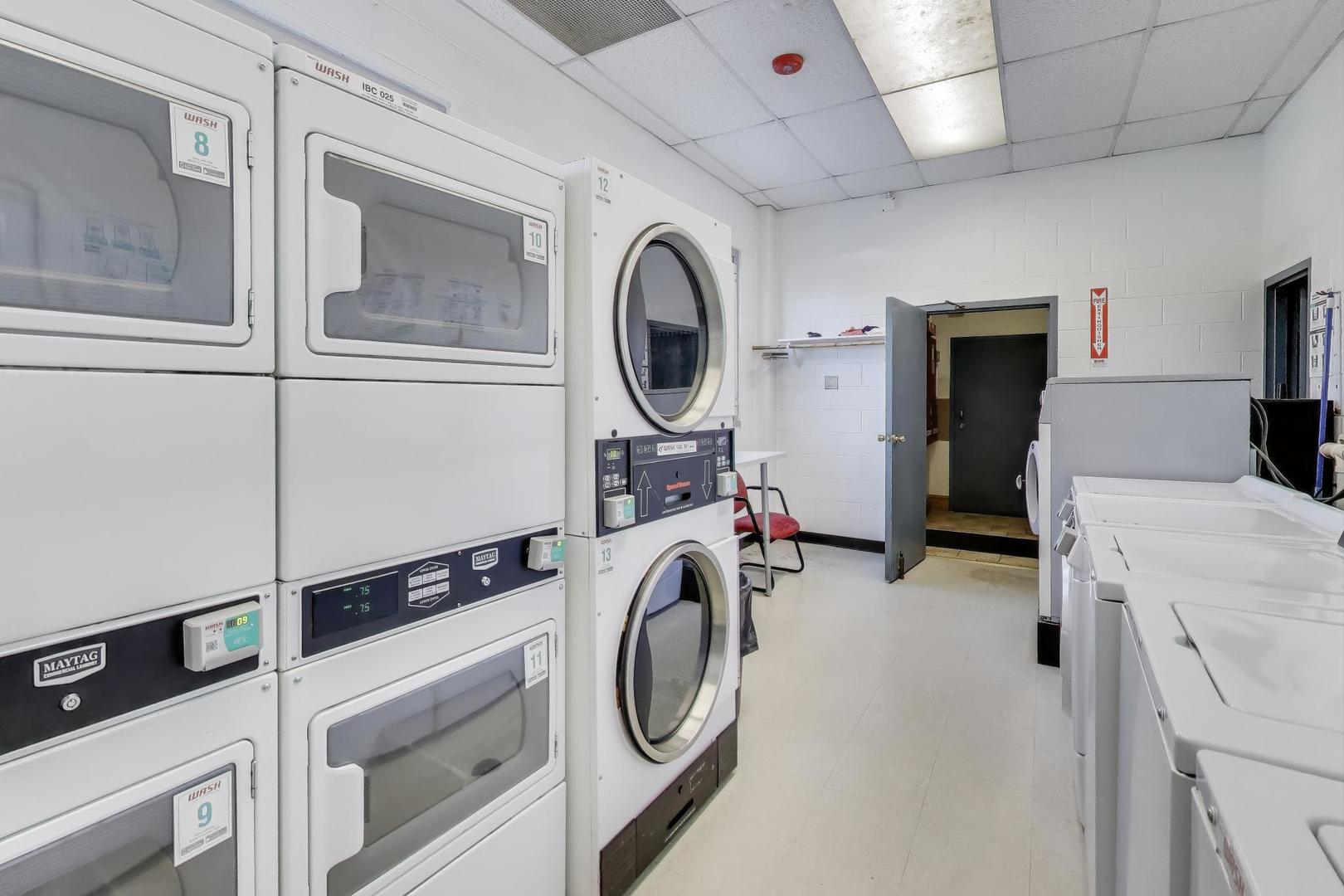 Undisclosed Address Lombard, IL 60148 - Photo 28 of 37 a utility room with dryer and washer