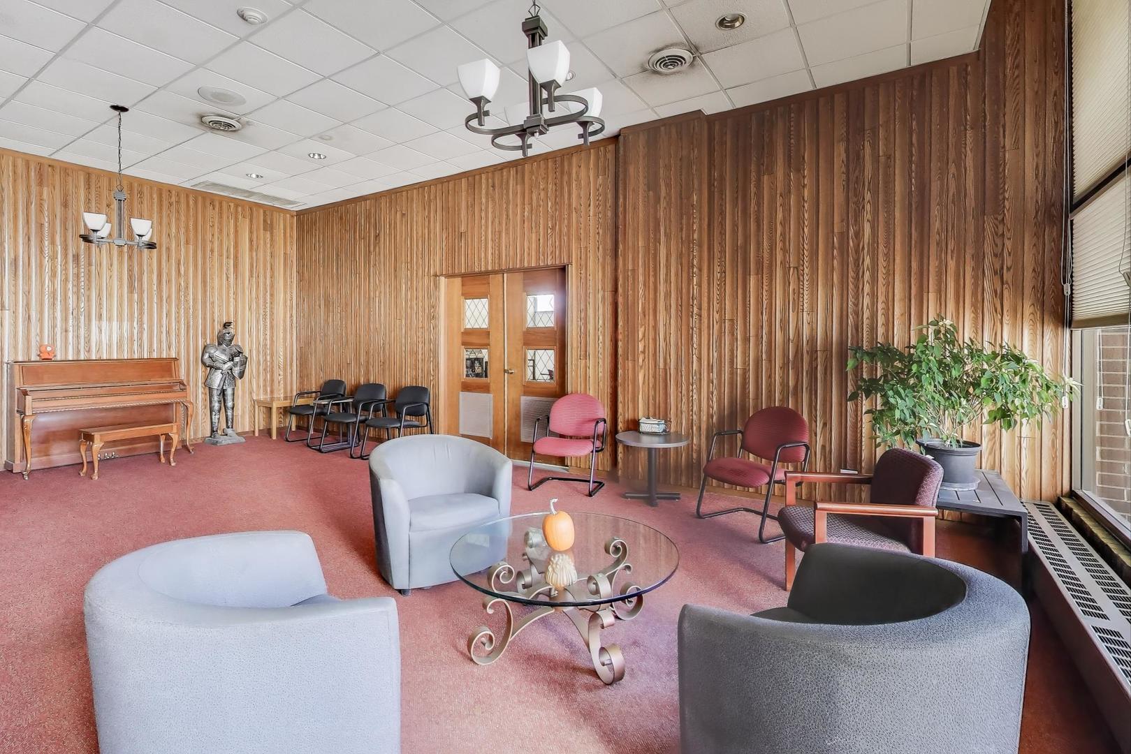 Undisclosed Address Lombard, IL 60148 - Photo 8 of 37 a living room with furniture and a large window
