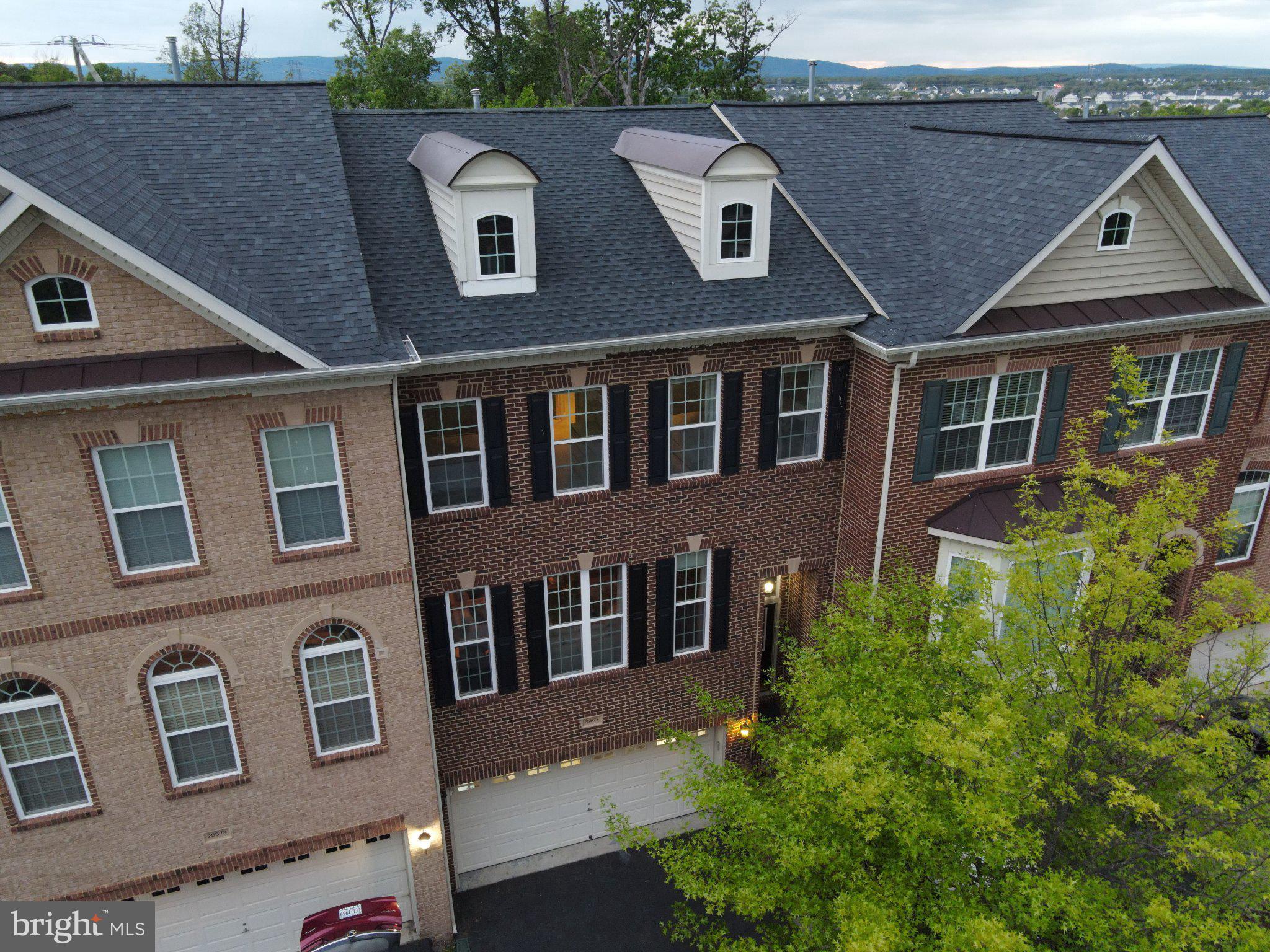Charming brick townhouse with modern flair.