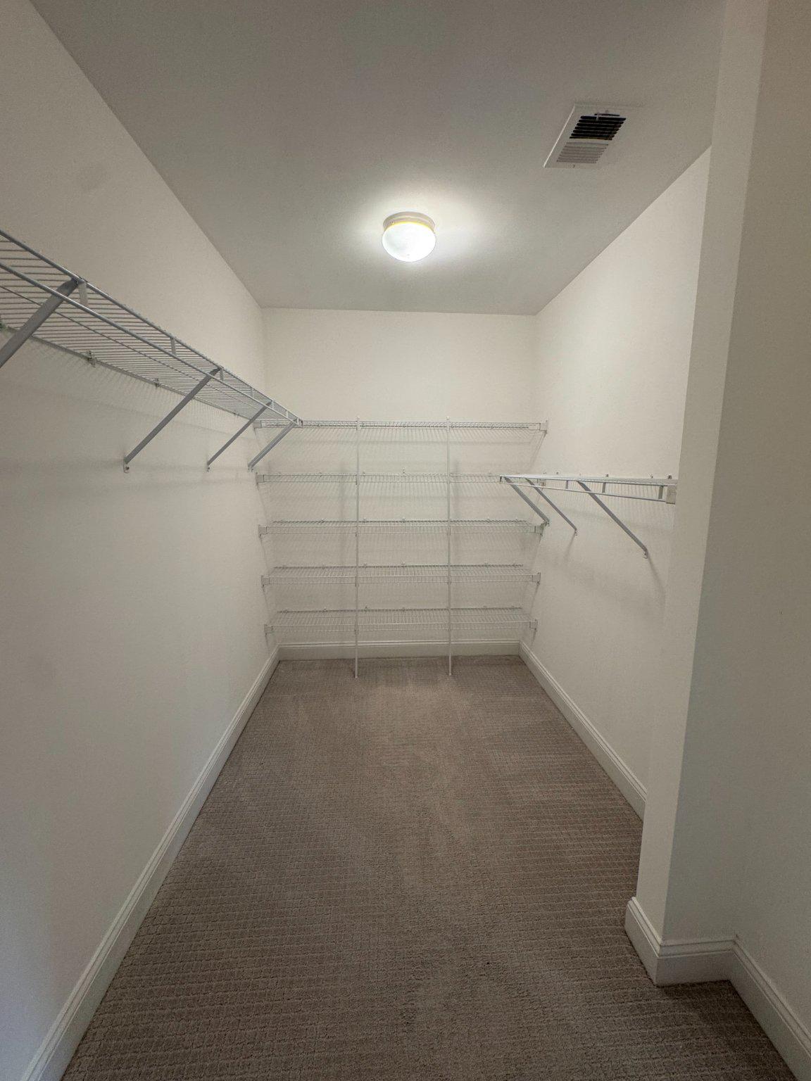 25577 Soft Mist Terrace Aldie, VA 20105 - Photo 19 of 30 Spacious master bedroom closet space awaits.