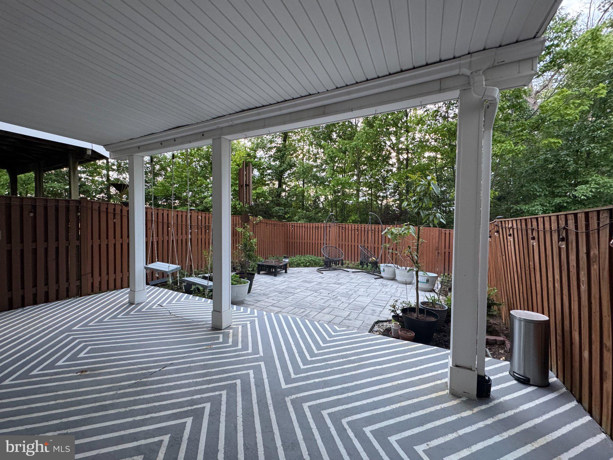 25577 Soft Mist Terrace Aldie, VA 20105 - Photo 27 of 30 Charming patio with lush greenery.