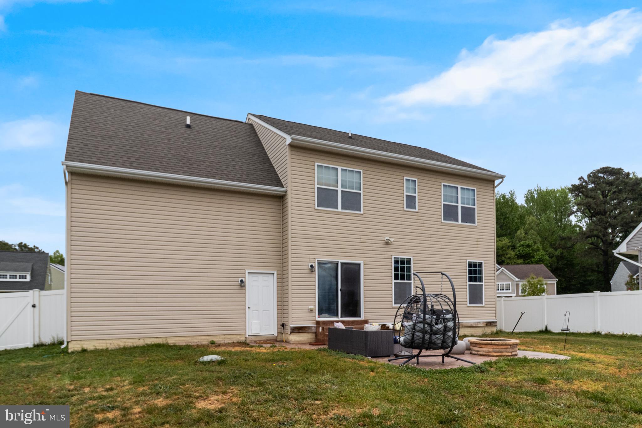 45546 Bethson Street California, MD 20619 - Photo 31 of 36 Fenced backyard with hardscape and firepit