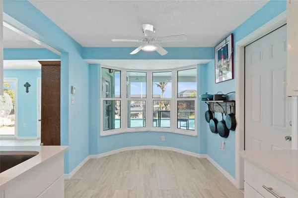 a view of livingroom with hardwood floor and hallway