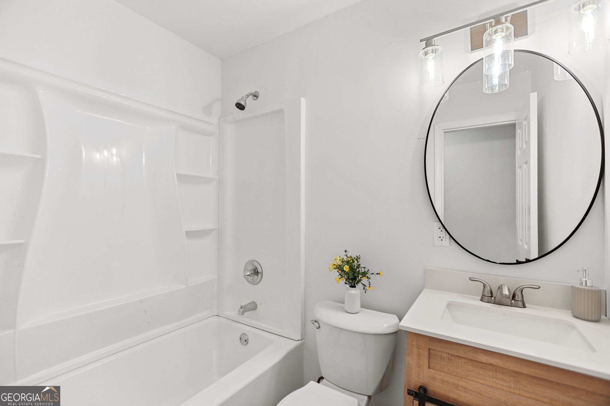 7060 Scenic Heights Road Manchester, GA 31816 - Photo 20 of 52 a bathroom with a sink toilet and a mirror