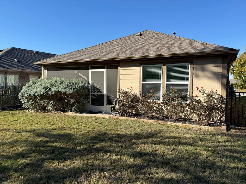 233 Hobby Street Georgetown, TX 78633 - Photo 10 of 13 a front view of a house with a yard