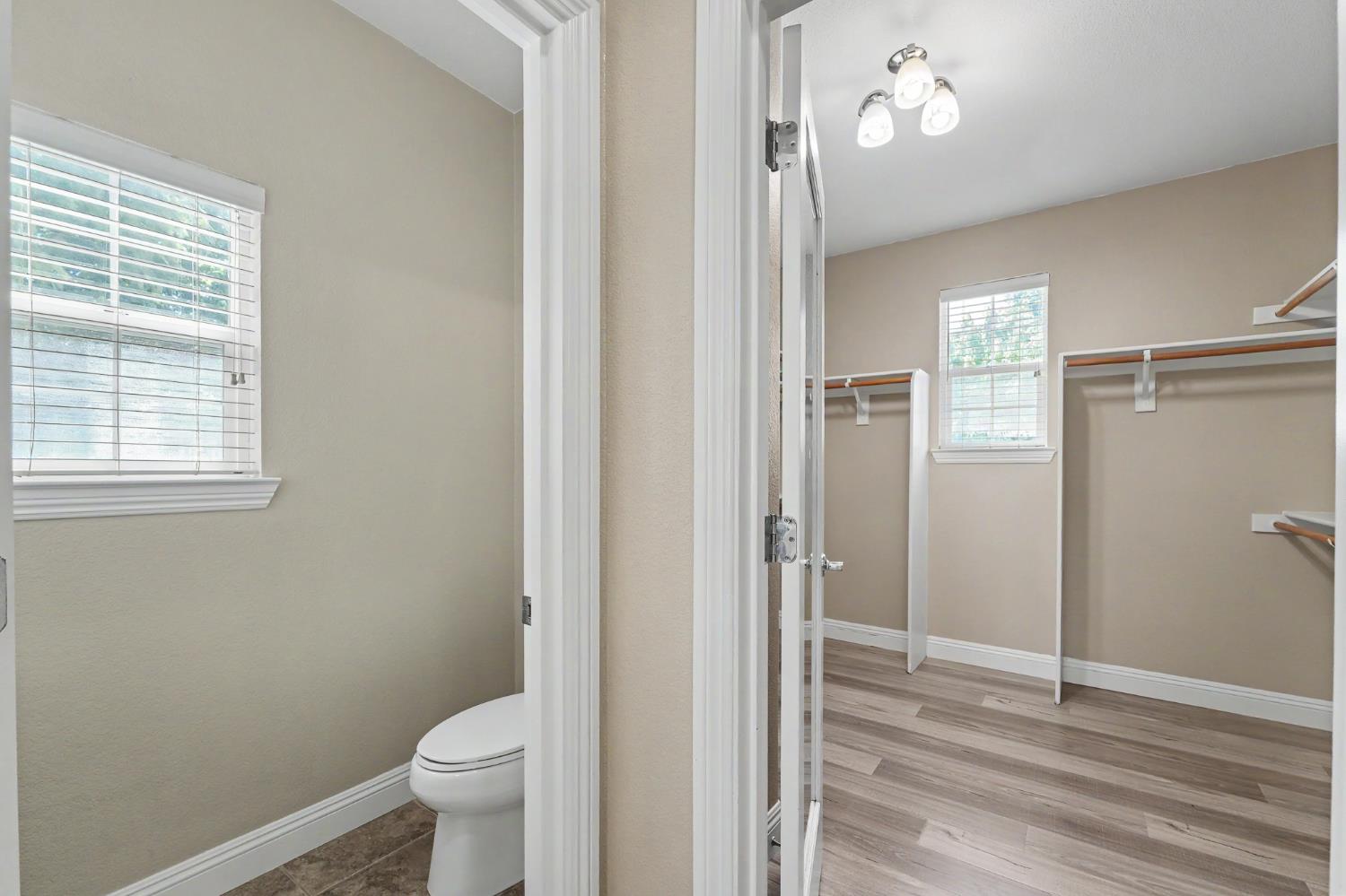 1223 East Springer Drive Turlock, CA 95382 - Photo 29 of 48 a bathroom with a toilet and a shower