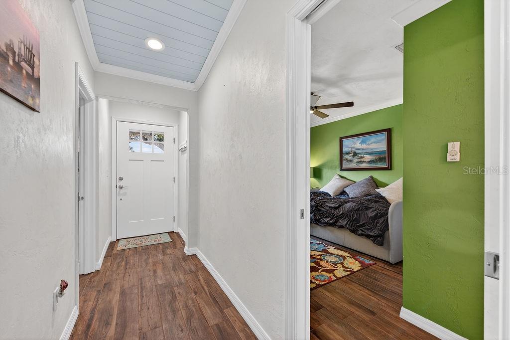 4719 Dixie Drive Ponce Inlet, FL 32127 - Photo 11 of 20 a view of a bedroom from a hallway