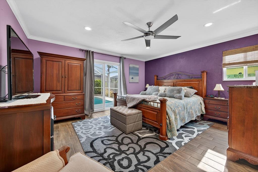 4719 Dixie Drive Ponce Inlet, FL 32127 - Photo 8 of 20 a bed room with a bed and a window