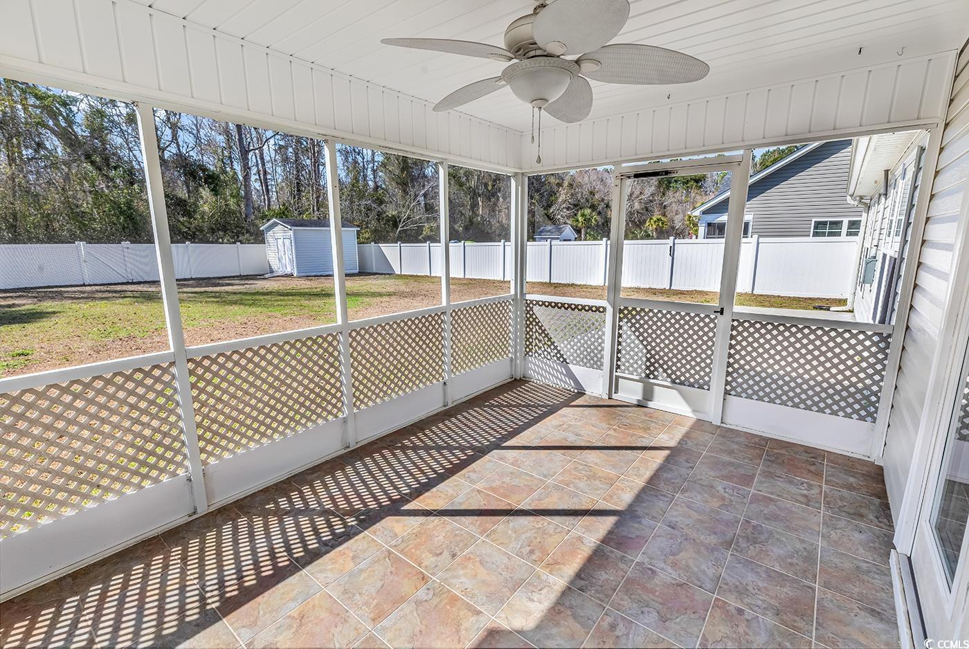 290 Georgia Mae Loop Conway, SC 29527 - Photo 34 of 40 Overlooks fenced back yard with ceiling fan.