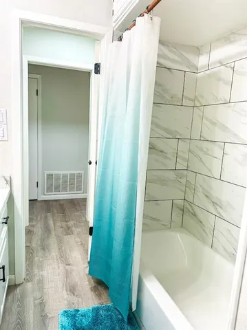 a bathroom with a bathtub