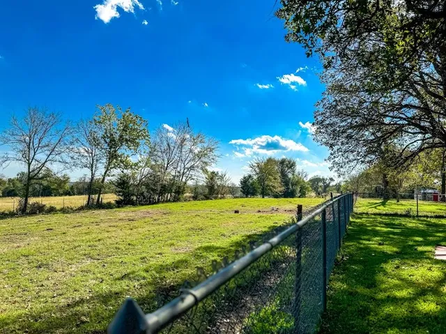 a view of an outdoor space and a yard