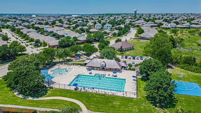 an aerial view of a house with a garden