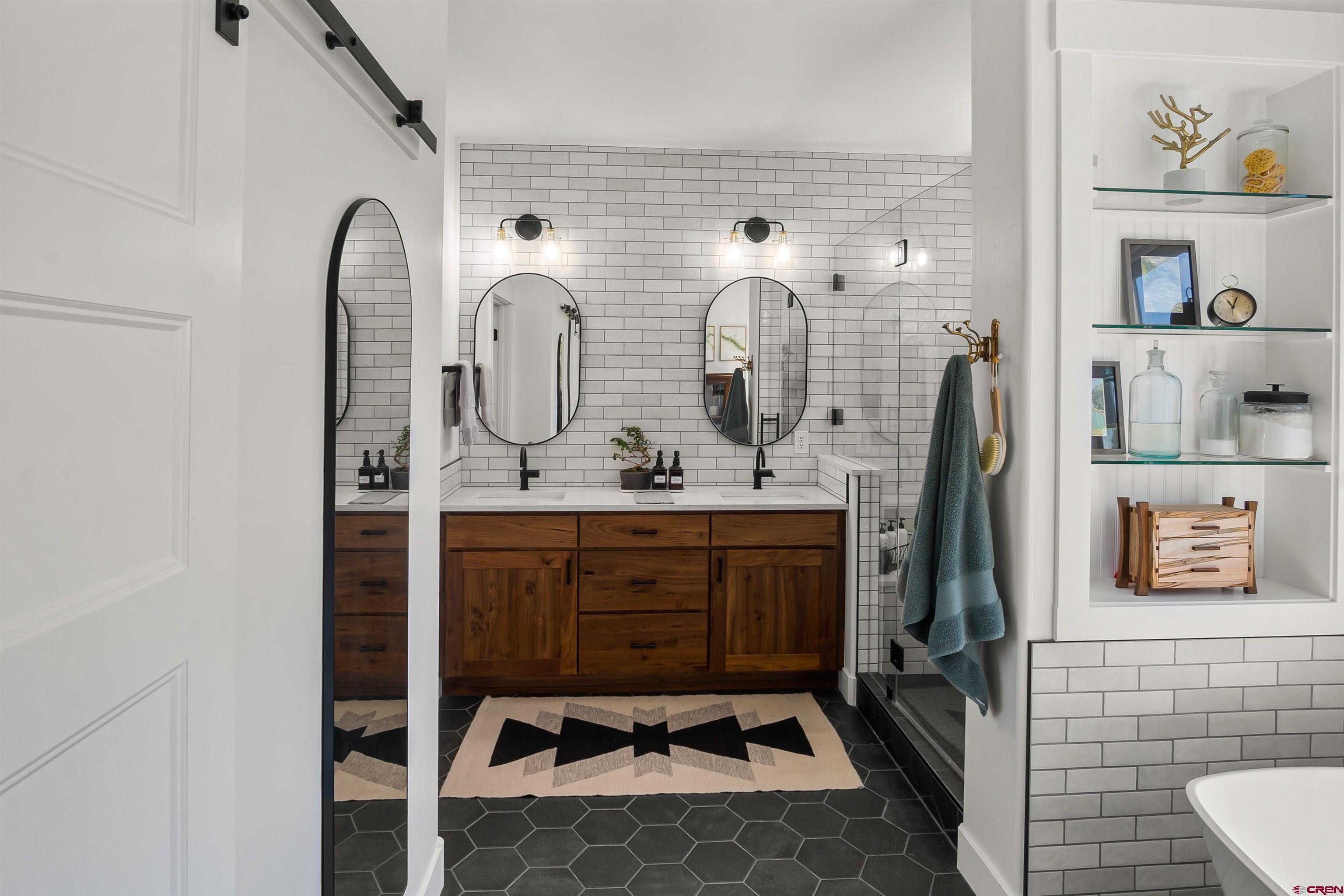 17 St Andrews Circle Durango, CO 81301 - Photo 13 of 28 a bathroom with a sink and mirror