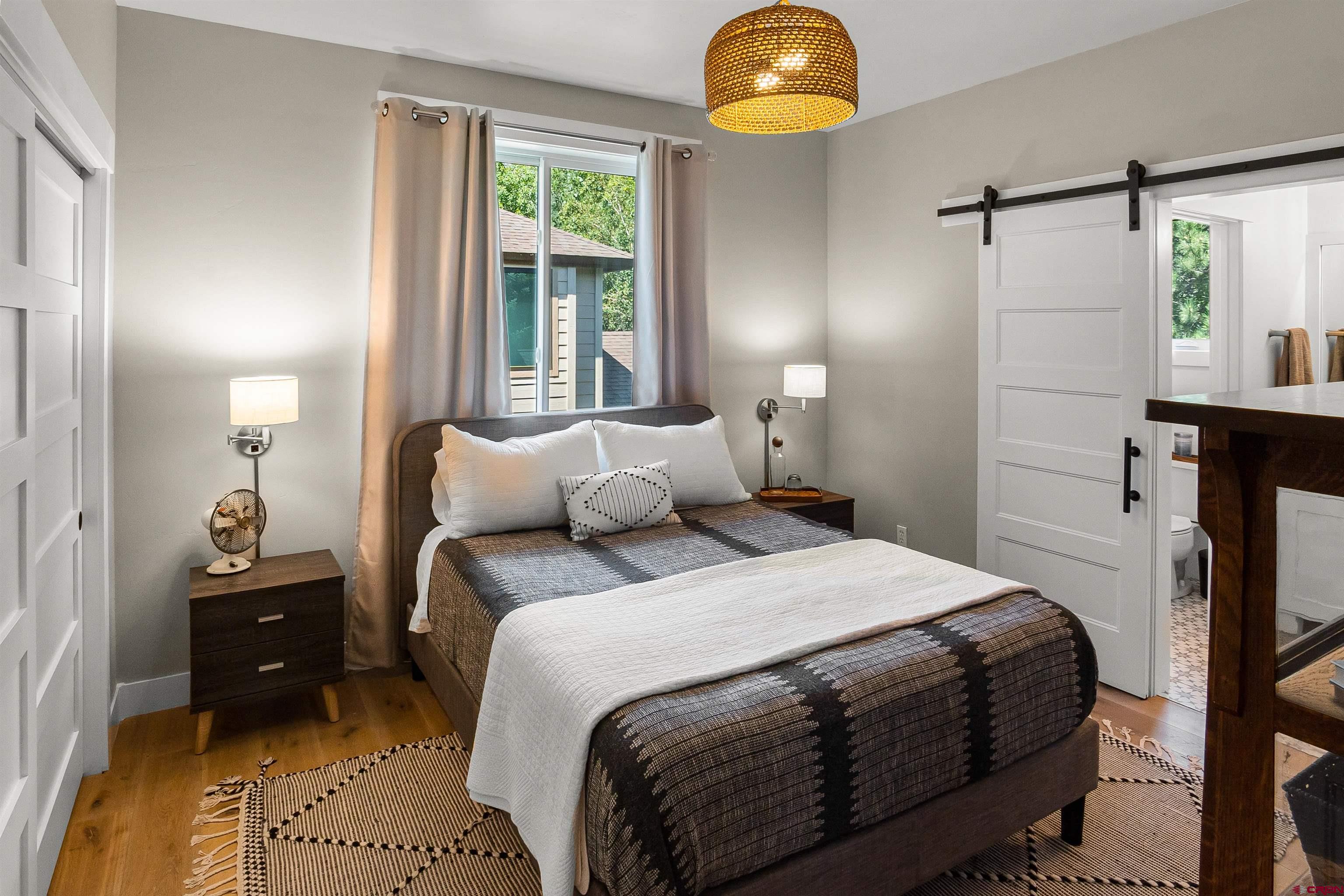 17 St Andrews Circle Durango, CO 81301 - Photo 15 of 28 a bedroom with a bed and a window