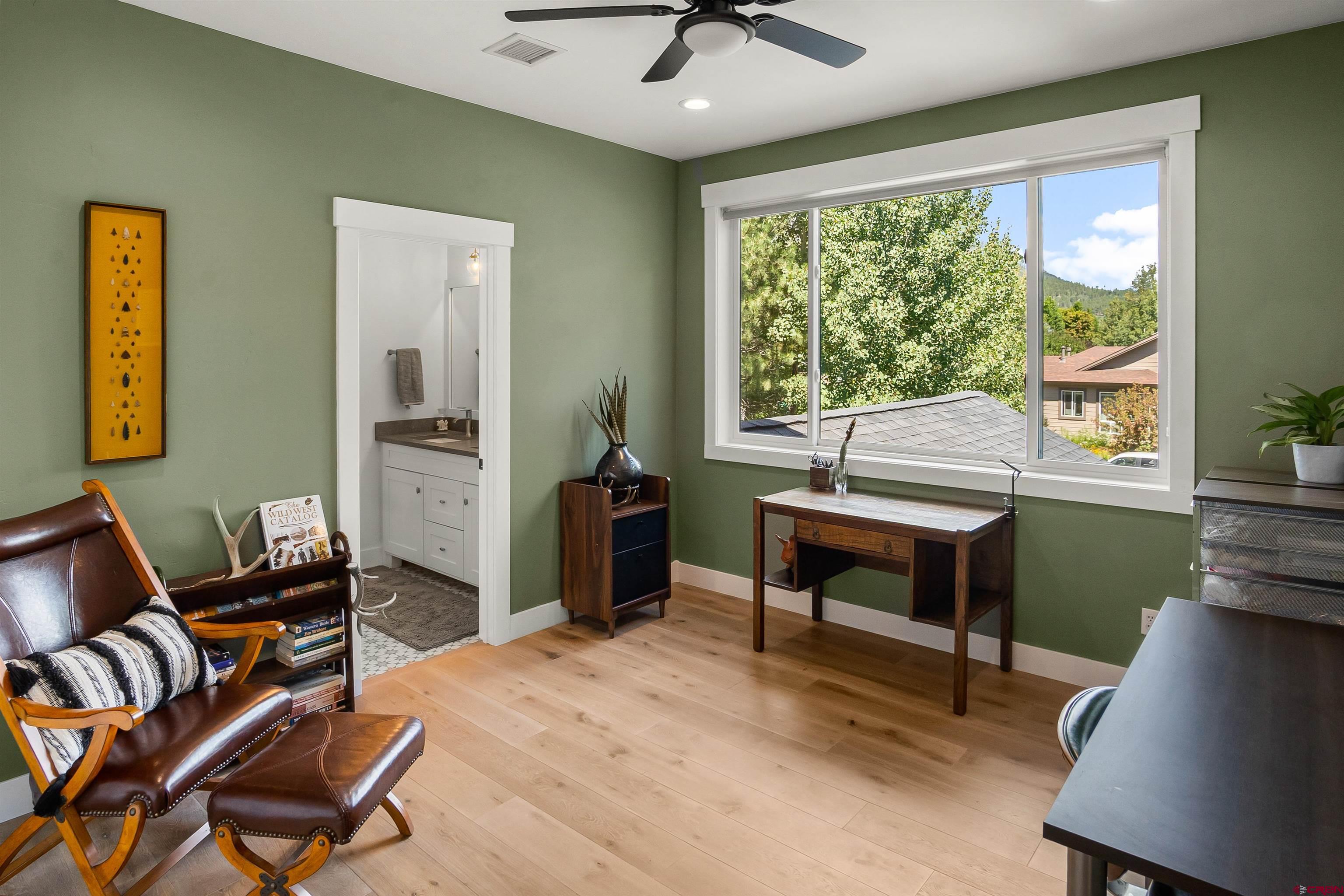 17 St Andrews Circle Durango, CO 81301 - Photo 19 of 28 a bedroom with furniture and a window
