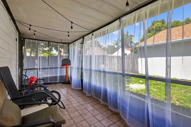a room with furniture and a window