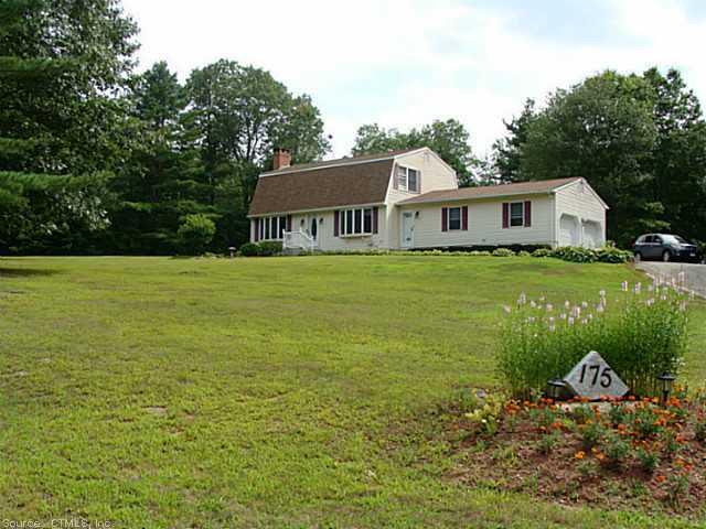 175 Fox Road Putnam, CT 06260 - Photo 1 of 1 a front view of a house with garden