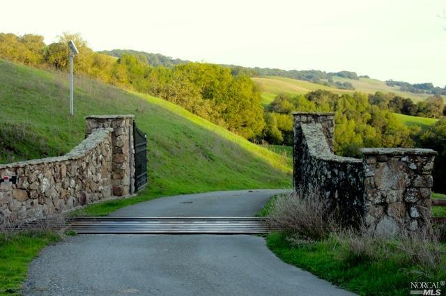 3280 Old Adobe Road Petaluma, CA 94954 - Photo 1 of 1 a view of a street with a yard and large trees